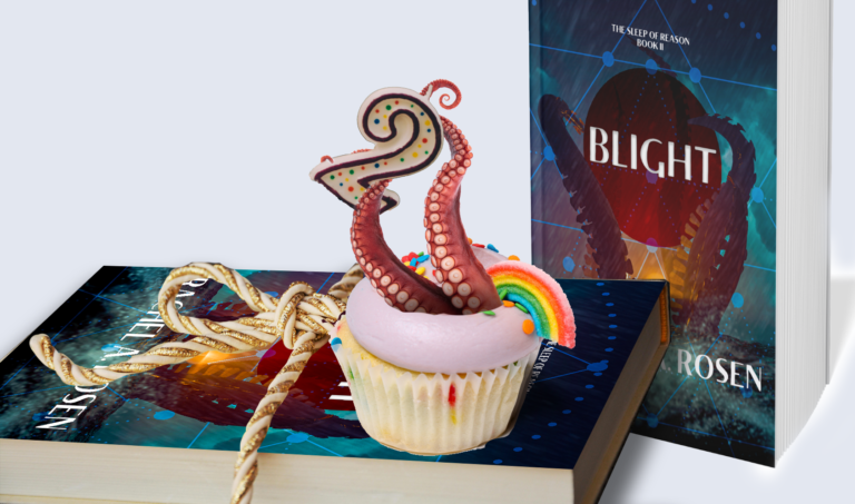an image of two copies of Blight by Rachel A. Rosen. There's a pink cupcake with rainbow decorations sitting on one. Tentacles are bursting out of it holding a 2 candle.